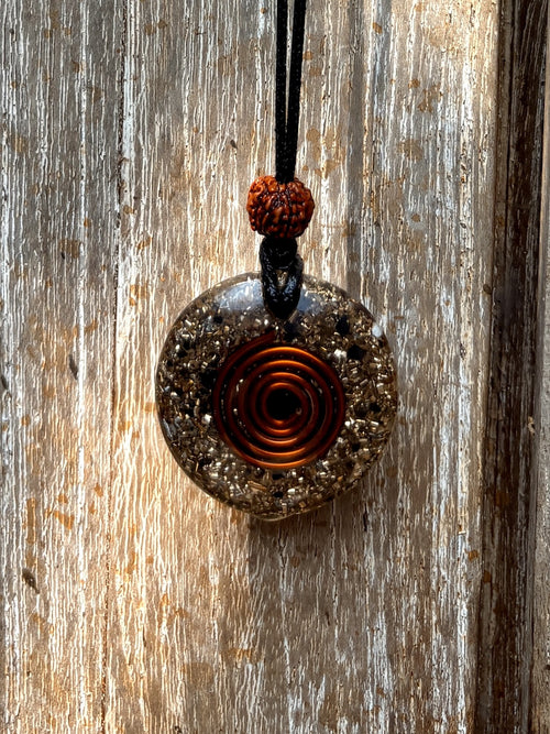 Bali Coin Tensioning Pendant reverse side Tesla spiral copper wire dark metal matrix rudraksha bead black cord orgonite Batuan Bali