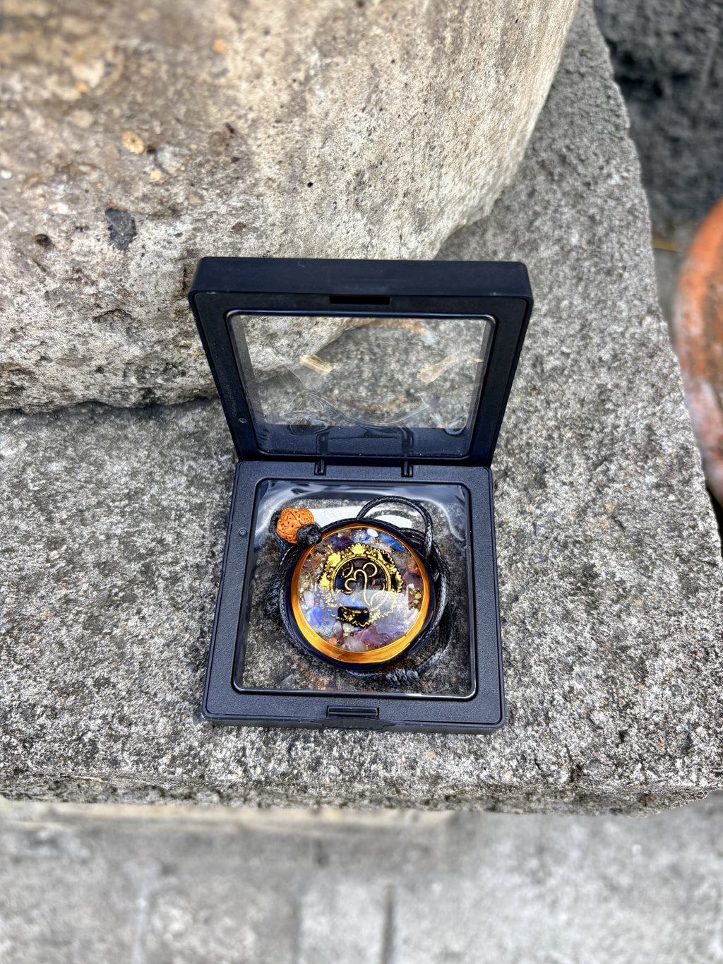 Bali Omkara Pendant in premium black floating display gift box chakra stone matrix gold Om symbol Batuan Bali