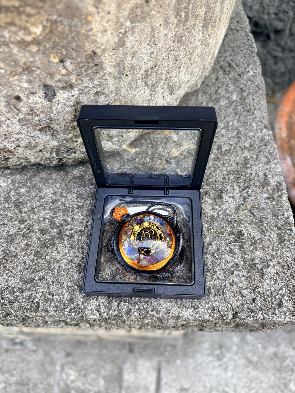 Bali Omkara Pendant in premium black floating display gift box chakra stone matrix gold Om symbol Batuan Bali