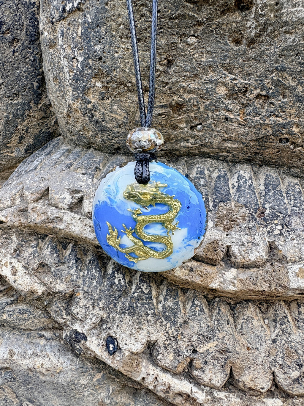 Blue Dragon Prosperity Pendant front cobalt blue white marbled resin large gold dragon charm orgonite matrix bail bead black cord