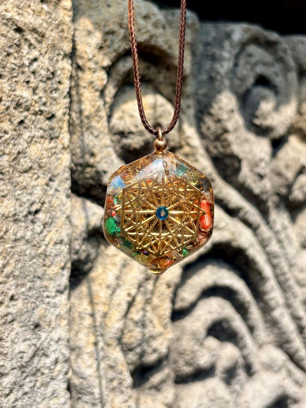 Merkaba Metatron Pendant Flower of Life Metatrons Cube brass disc moonstone red garnet red coral quartz hexagonal clear resin brown cord Batuan Bali