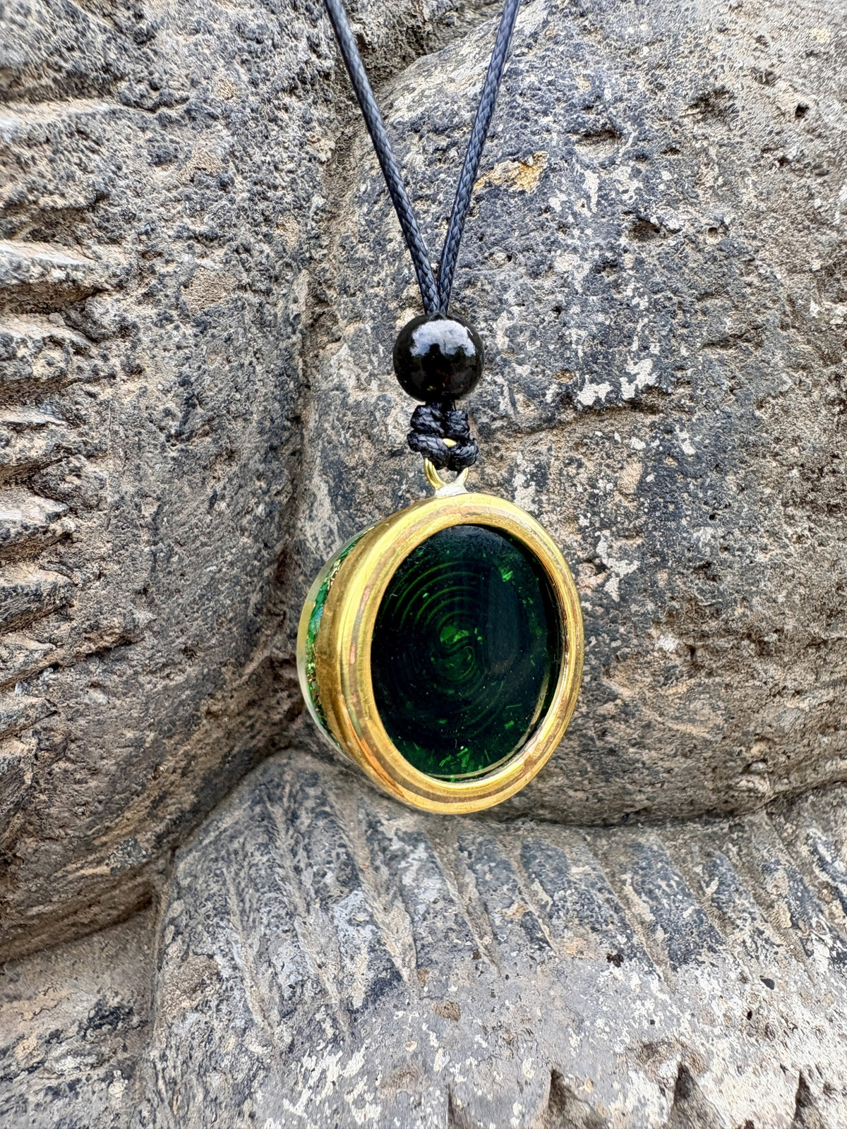 Mini Daisy Pendant with Yellow Brass reverse deep forest green resin concentric Archimedean spiral yellow brass border ring black onyx bail bead