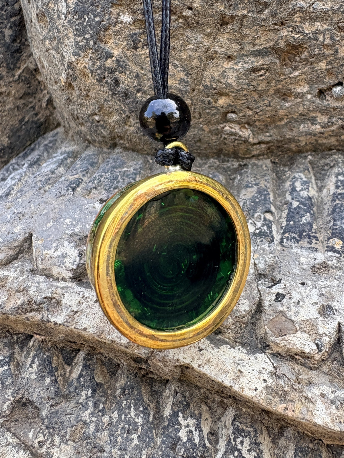 Mini Flower Pendant Yellow Brass reverse deep forest green resin disc gold brass border ring black onyx bead bail black cord