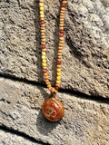 Mini Omkara Mala Pendant red jasper copper frame Om symbol orgonite warm amber resin full Rudraksha mala necklace red golden beads Batuan Bali