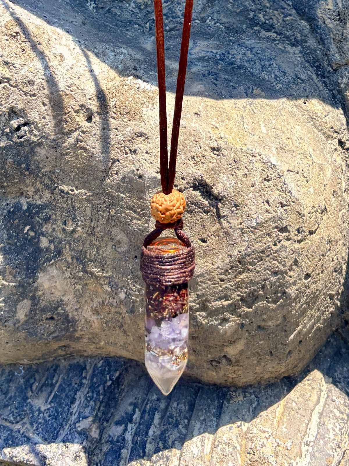 Pendulum Adra orgonite wand pendant amethyst purple copper winding rudraksha bead brown leather cord clear resin Batuan Bali