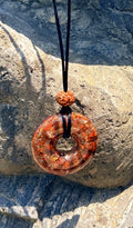 Rodin Donut Pendant red jasper copper winding rudraksha bead black cord torus orgonite root chakra handcrafted Batuan Bali