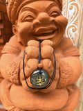Shiva Trishula Pendant gold trishula third eye stone rudraksha bead black cord orgonite dark matrix Kubera Batuan Bali