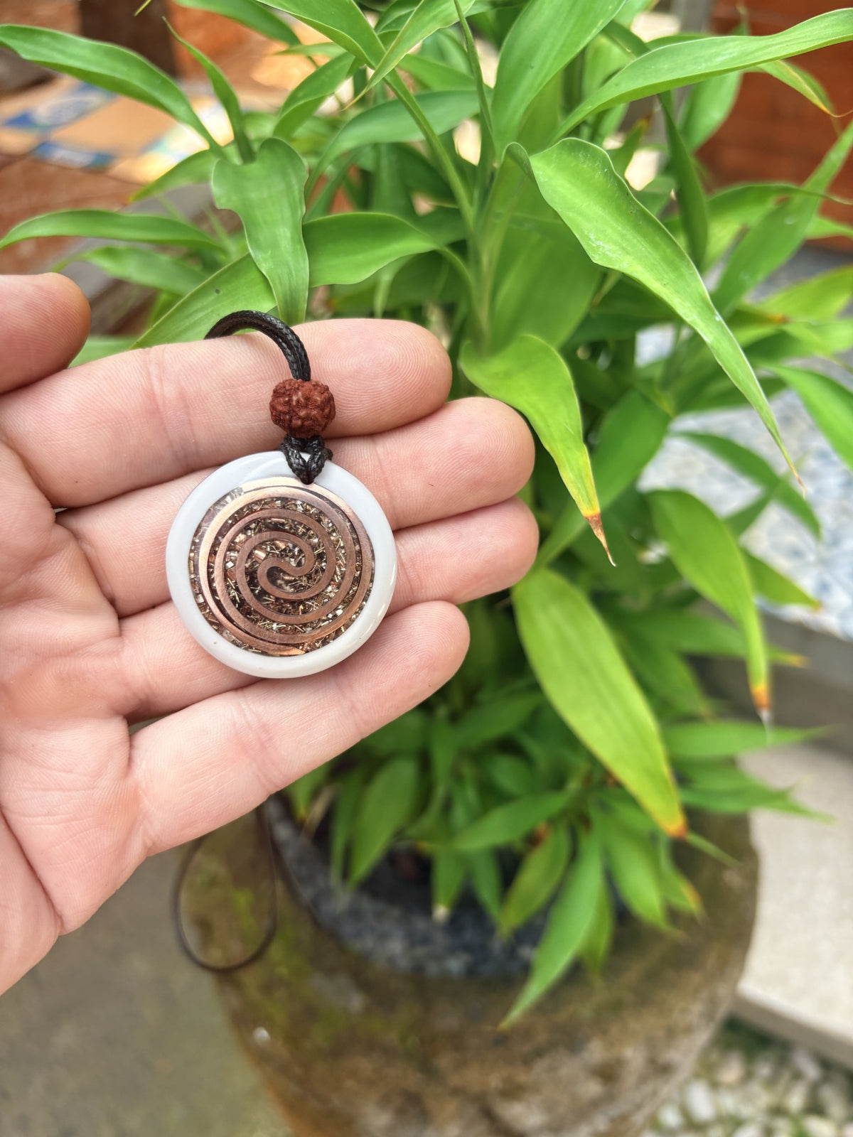 Shiva Trishula Pendant white frame reverse yellow brass Fibonacci spiral coil mixed stone orgonite matrix Batuan Bali