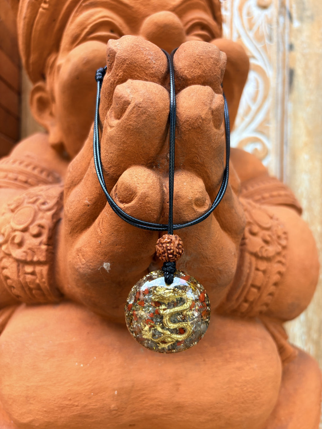 Small Dragon Prosperity Pendant gold dragon clear quartz red jasper rudraksha bead black cord orgonite Ganesha Batuan Bali